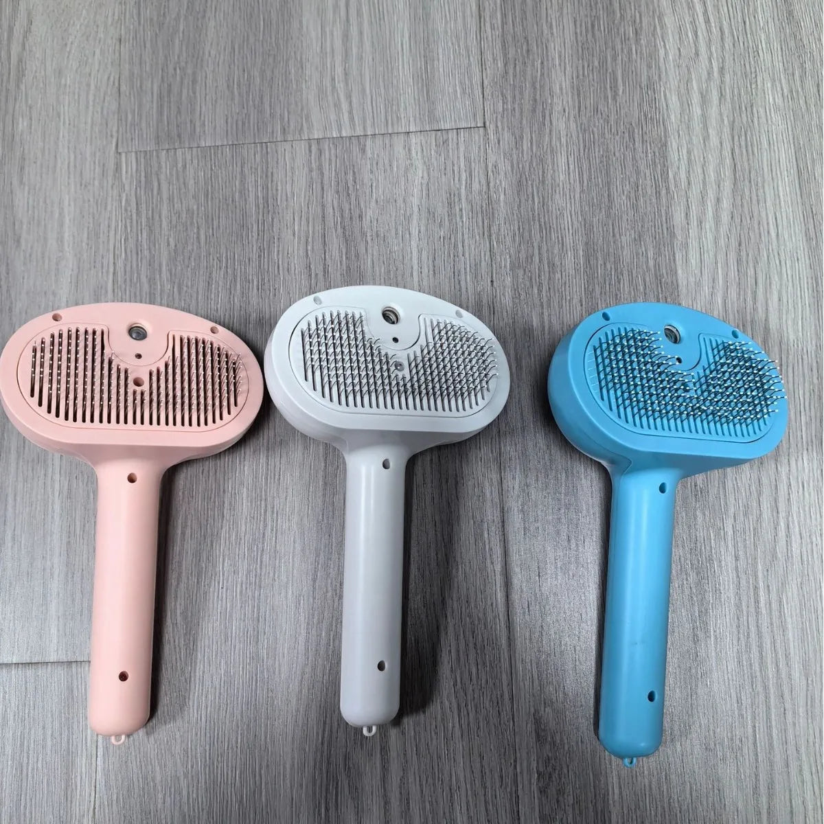 Brosse pour chien rose